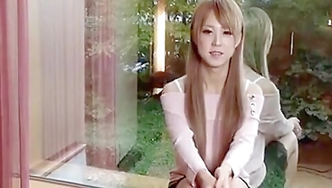 Japanese transsexual is stripping and jerking in the bedroom