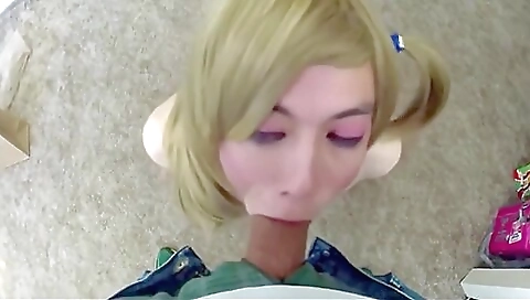 Blonde girl is giving a deepthroat blowjob to a guy