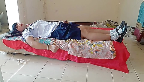 Amateur teen with a nice figure is wearing a school uniform